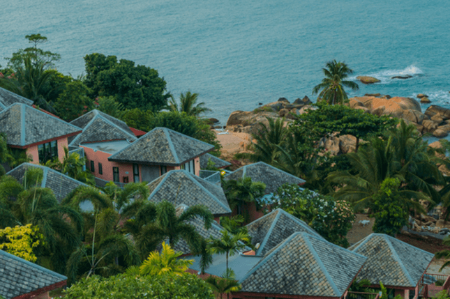 Beachfront villas along the Thai coastline